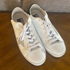 Superstar Golden Goose Womens Hi Star all leather Sneakers.